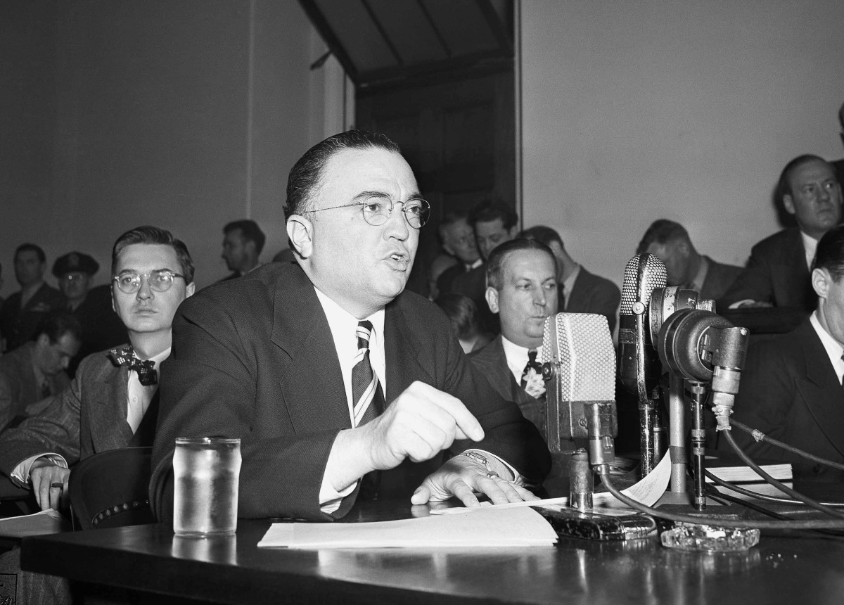 FILE - This March 26, 1947, file photo shows Federal Bureau of Investigation Director J. Edgar Hoover calling the communist party of the United States a "Fifth Column" whose "goal is the overthrow of our government" during testimony before the House Un-American Activities Committee in Washington. Fearing a Russian invasion and occupation of Alaska, the U.S. government in the early Cold War years recruited and trained fishermen, bush pilots, trappers and other private citizens across Alaska for a covert network to feed wartime intelligence to the military, newly declassified Air Force and FBI documents show. Hoover teamed up on a highly classified project, code-named ?Washtub,? with the newly created Air Force Office of Special Investigations, headed by Hoover protege and former FBI official Joseph F. Carroll. (AP Photo/File)