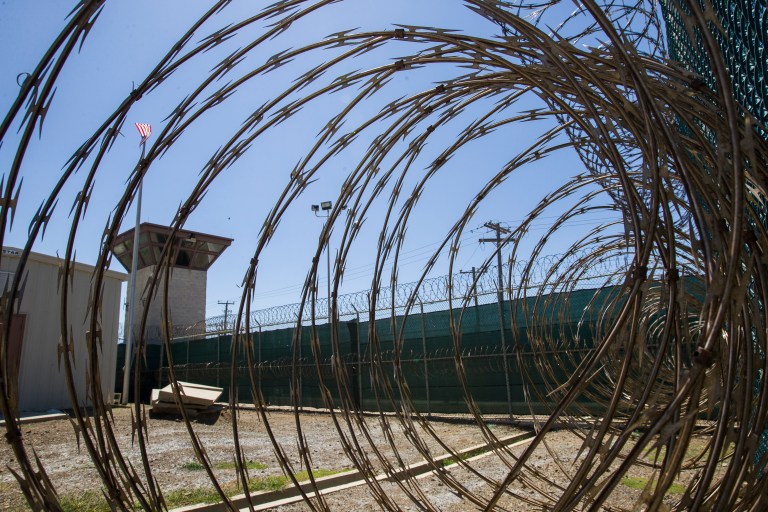 The control tower is seen through the razor wire inside the Camp VI detention facility in Guantanamo Bay Naval Base, Cuba in 2019.