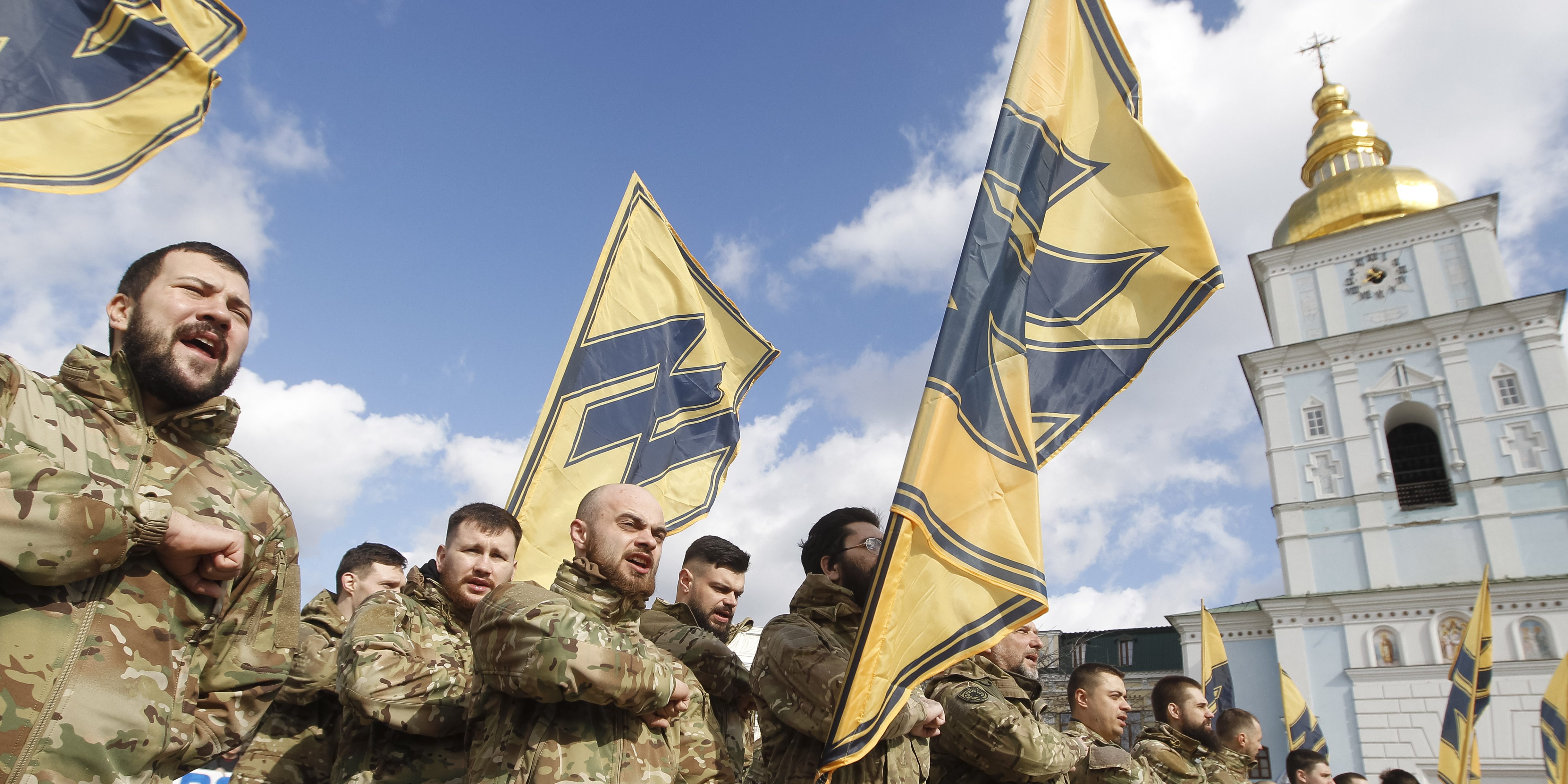 KIEV, KYIV, UKRAINE - 2020/03/14: 'Azov' far-right activists shout slogans during the march.
Thousands of Ukrainian servicemen and volunteers took part in the March of patriots marking the Volunteer Day honouring soldiers who joined the Ukrainian Army during a military conflict in eastern Ukraine. (Photo by Pavlo Gonchar/SOPA Images/LightRocket via Getty Images)