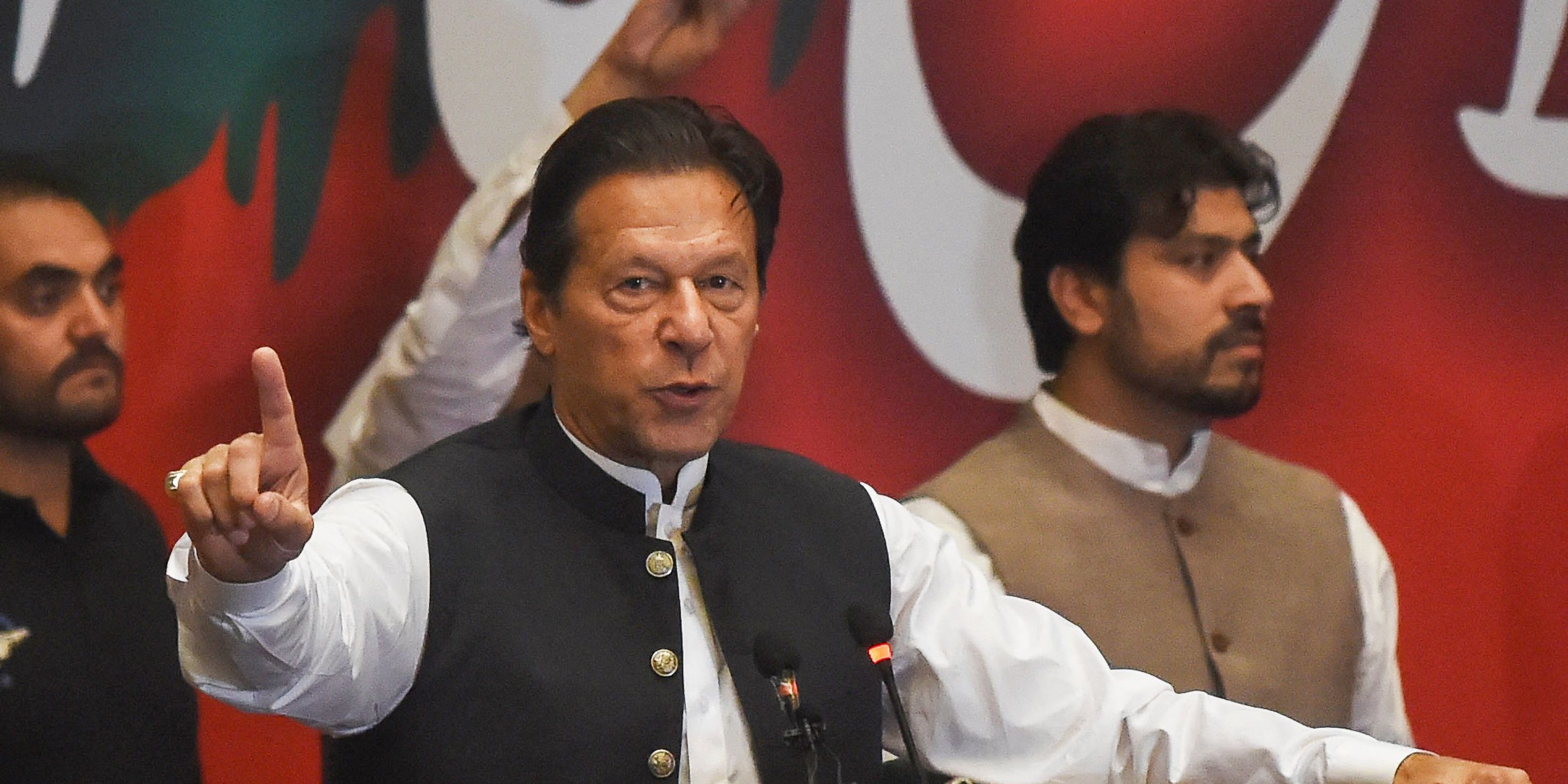 Former Pakistan's prime minister Imran Khan, who was ousted by opposition parties through a no-confidence motion, gestures as he addresses Pakistan Tehreek-e-Insaf (PTI) party workers during a party convention in Lahore on April 27, 2022. (Photo by Arif ALI / AFP) (Photo by ARIF ALI/AFP via Getty Images)