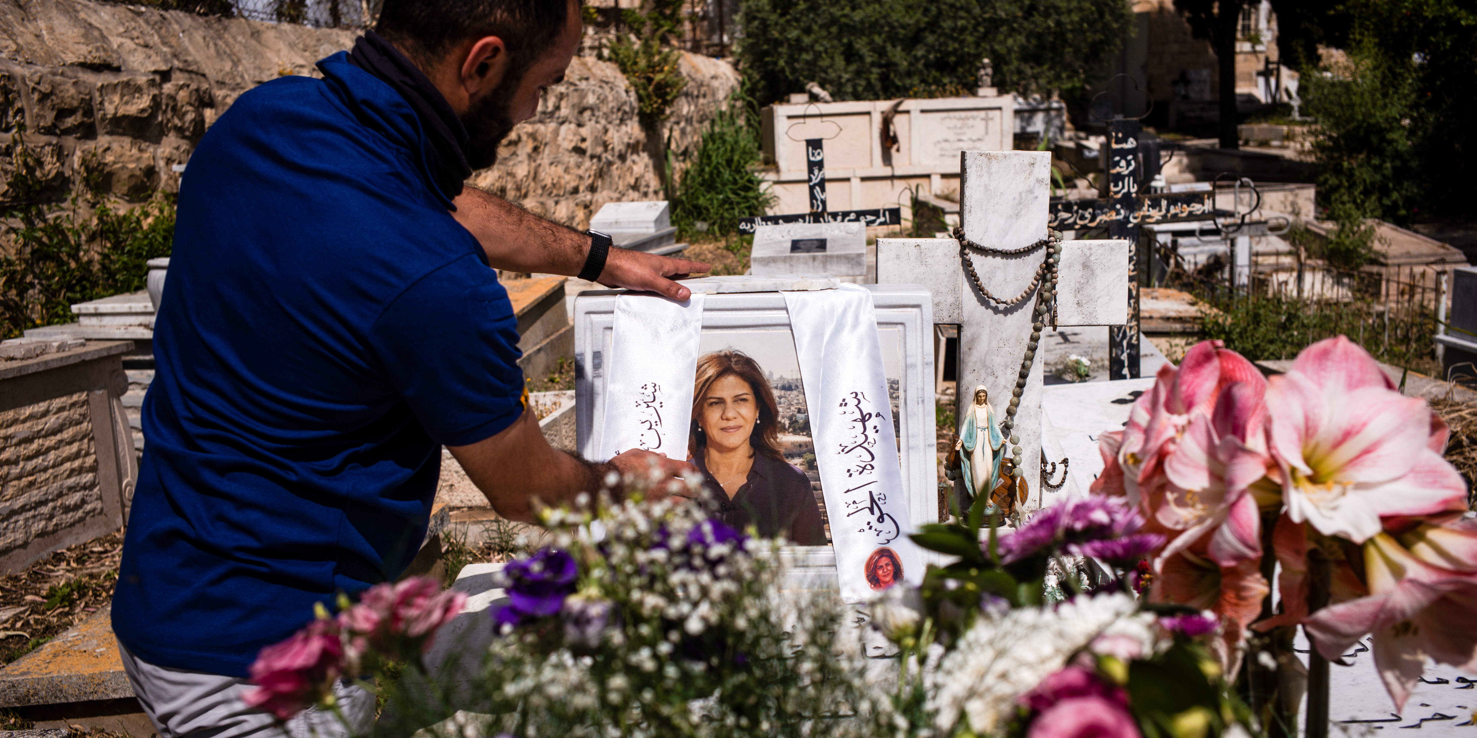 07 May 2023, ---, Jerusalem: Grave of the late Shireen Abu Akleh, Al-Jazeera journalist who was killed in Nablus while on a reporting mission, can be seen decorated with flowers a head of her death anniversary. Photo: Ilia Yefimovich/dpa (Photo by Ilia Yefimovich/picture alliance via Getty Images)