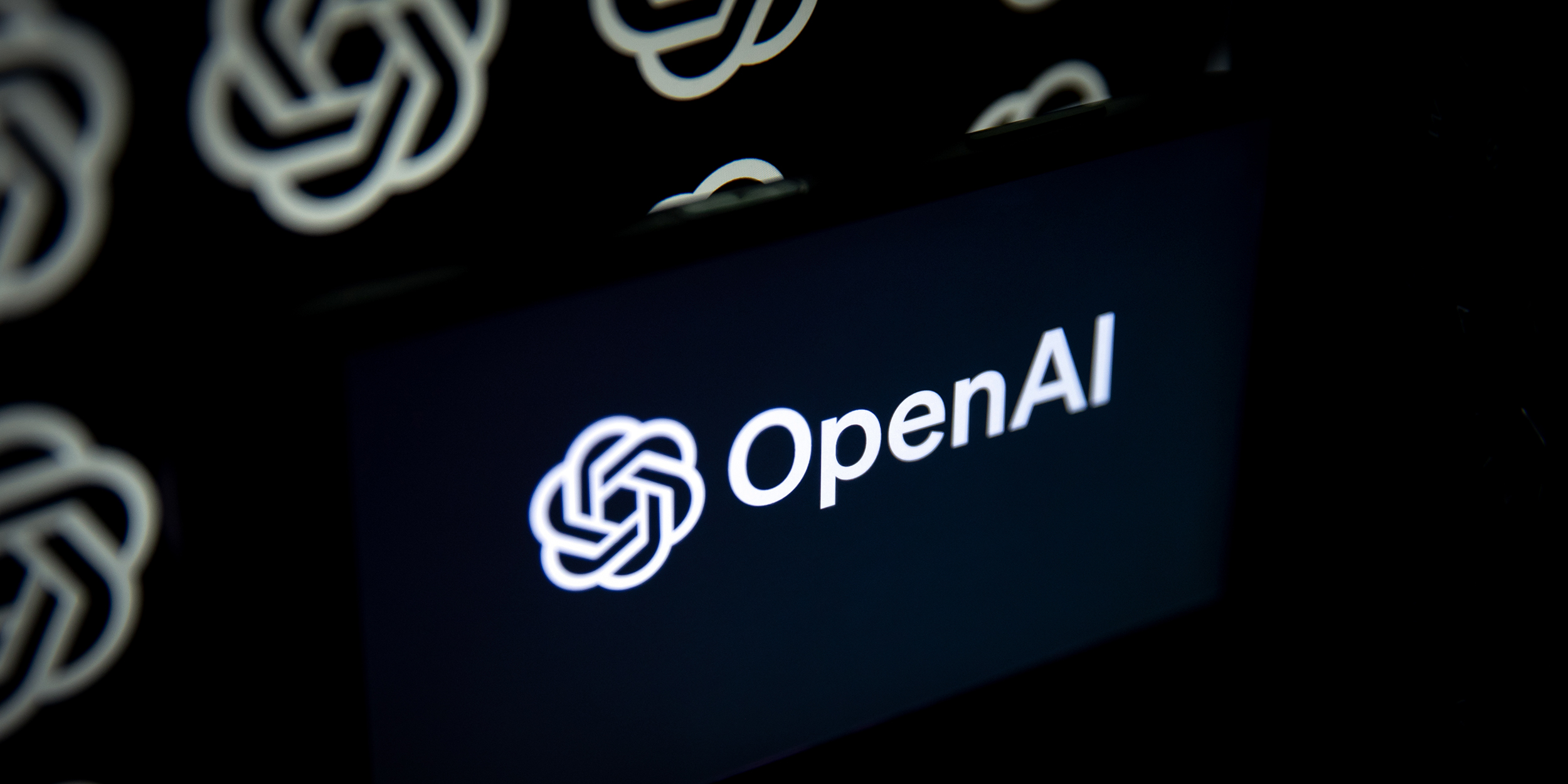 ANKARA, TURKIYE - SEPTEMBER 05: In this photo illustration, OpenAI logo is being displayed on a mobile phone screen in front of computer screen with the logo of ChatGPT on September 5, 2023 in Ankara, Turkiye. (Photo by Didem Mente/Anadolu Agency via Getty Images)