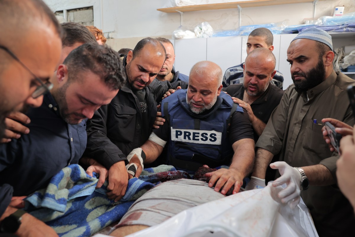 RAFAH, GAZA - JANUARY 07: Al Jazeera's bureau chief in Gaza, Wael Al-Dahdouh's son Hamza Wael Al-Dahdouh and Mustafa Thuraya, who were also journalists are killed in an Israeli bombing on their car in the city of Rafah, Gaza on January 07, 2024. Dahdouh, who is also wounded in the arm, lost his wife and two other children during the Israeli attacks. (Photo by Stringer/Anadolu via Getty Images)