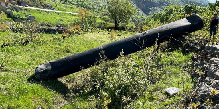 ERBIL, IRAQ - APRIL 14: A fragment of a missile fall on an empty field during the Iranian airstrikes against Israel in Soran district of Erbil, Iraq on April 14, 2024. (Photo by Stringer/Anadolu via Getty Images)