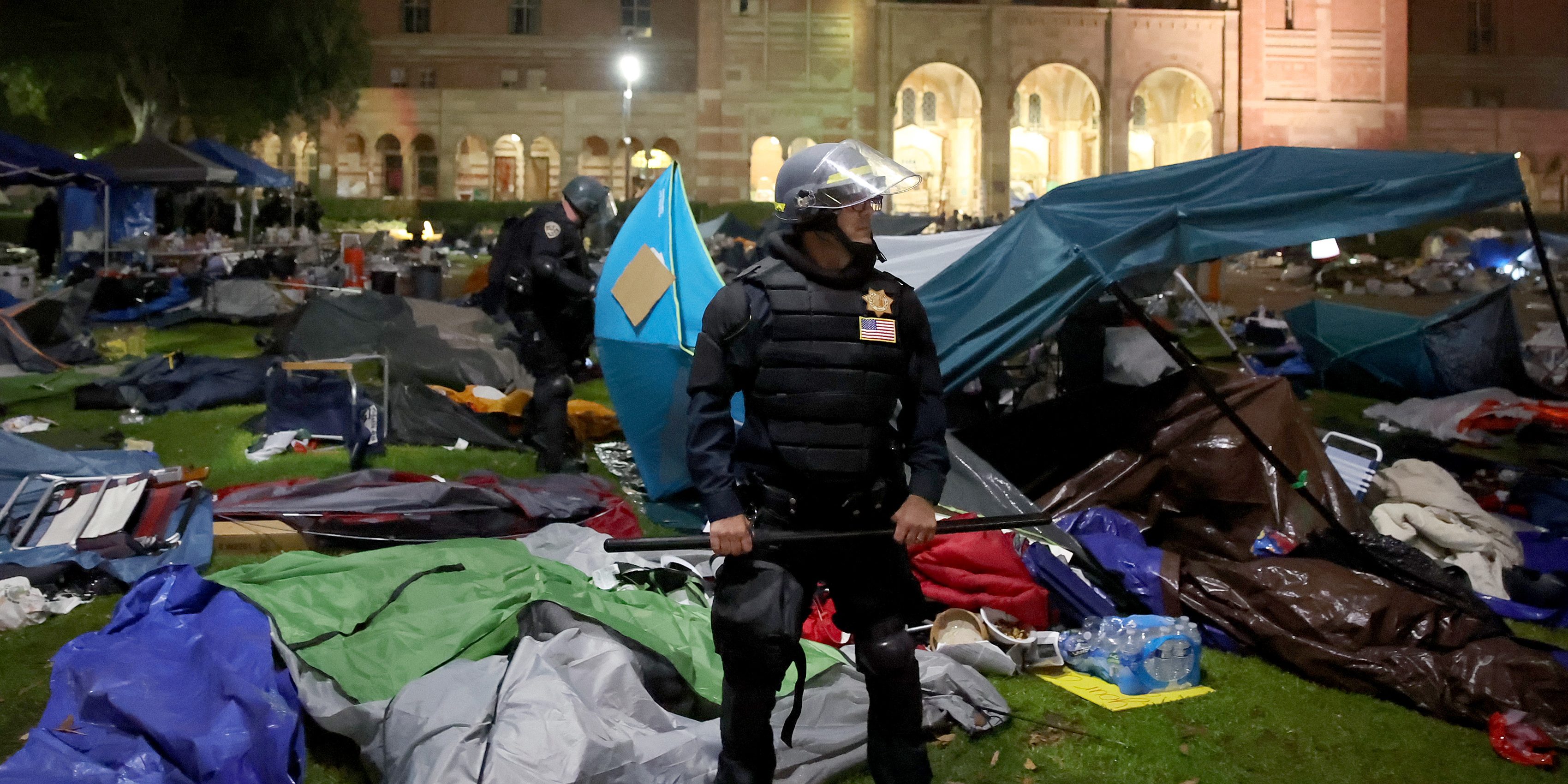 LOS ANGELES CA  MAY 2, 2024 -- Police tear down the tents on the UCLA campus Thursday, May 2, 2024. (Jason Armond / Los Angeles Times via Getty Images)