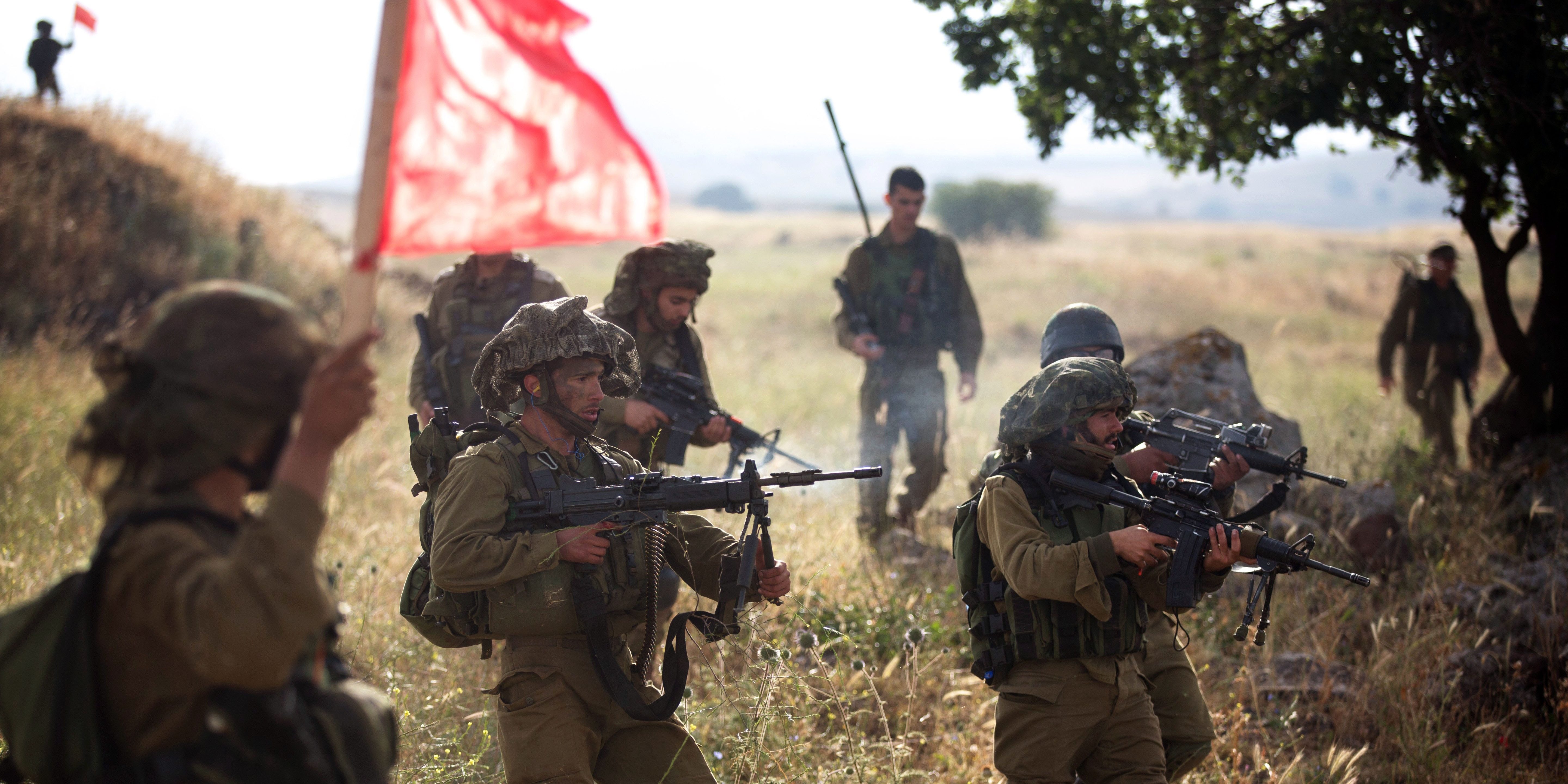 Israeli soldiers of the Ultra-Orthodox battalion "Netzah Yehuda" take part in training in the Israeli annexed Golan Heights, near the Syrian border on May 19, 2014.