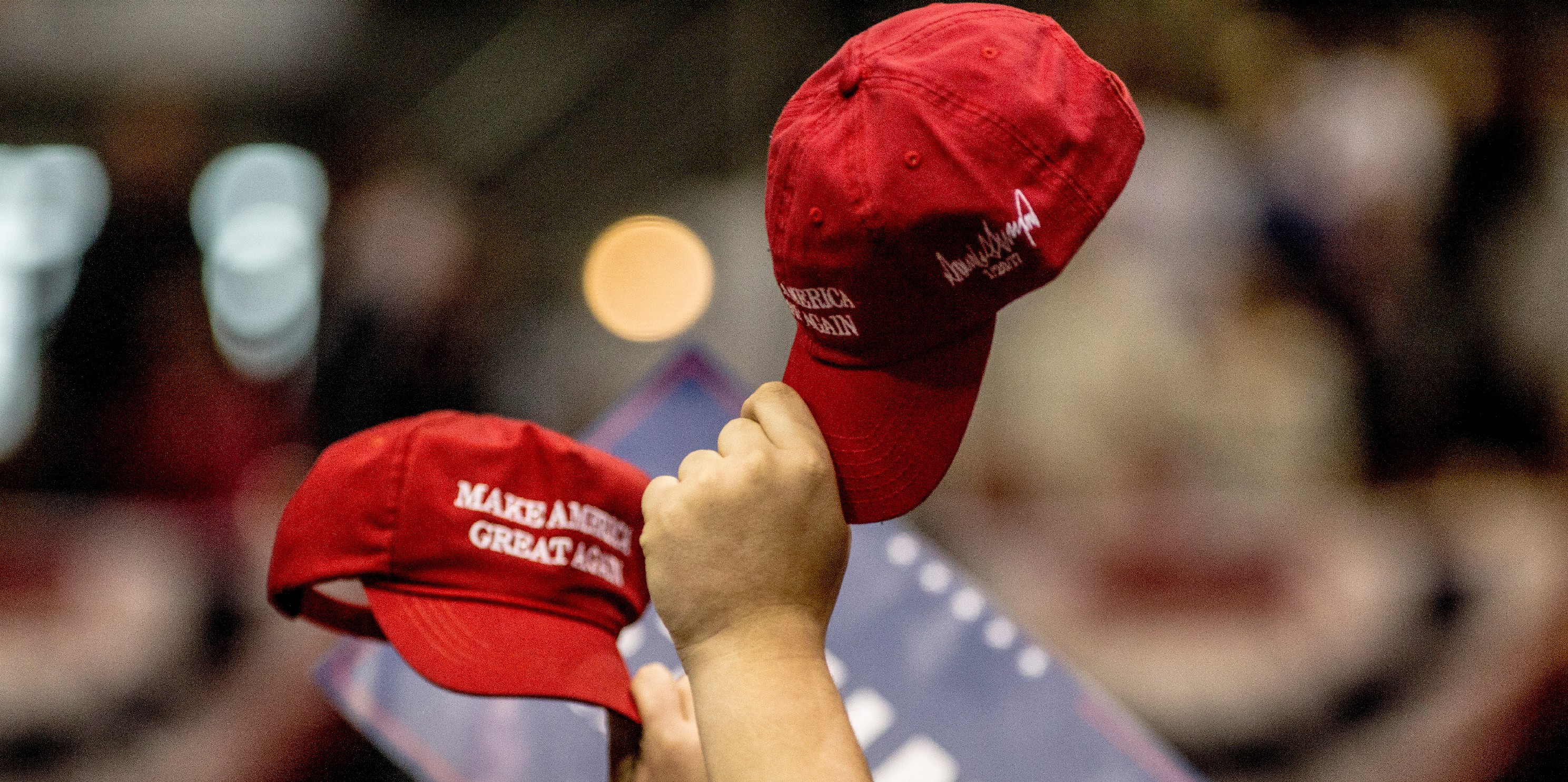 NASHVILLE, TN - MARCH 15: Supporters hold up their hats during a rally held by President Trump on March 15, 2017 in Nashville, Tennessee. During his speech President Trump promised to repeal and replace Obamacare and also criticized the decision by a federal judge in Hawaii that halted the latest version of the travel ban. (Photo by Andrea Morales/Getty Images)