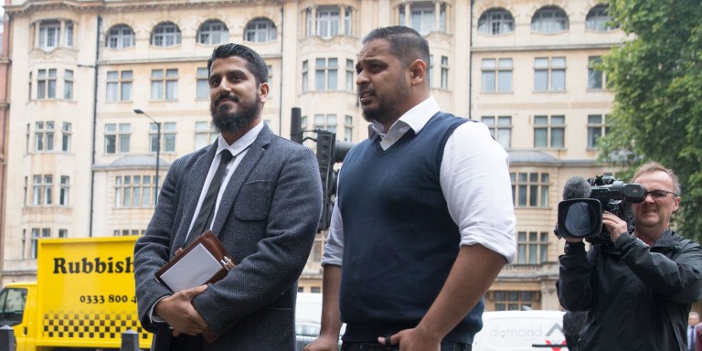 International director of campaign group Cage, Muhammad Rabbani (centre left) arrives at Westminster Magistrates' Court in London on September 25, 2017, for his trial, after being accused of refusing to reveal his mobile phone password at Heathrow Airport last year. / AFP PHOTO / Daniel LEAL-OLIVAS        (Photo credit should read DANIEL LEAL-OLIVAS/AFP/Getty Images)