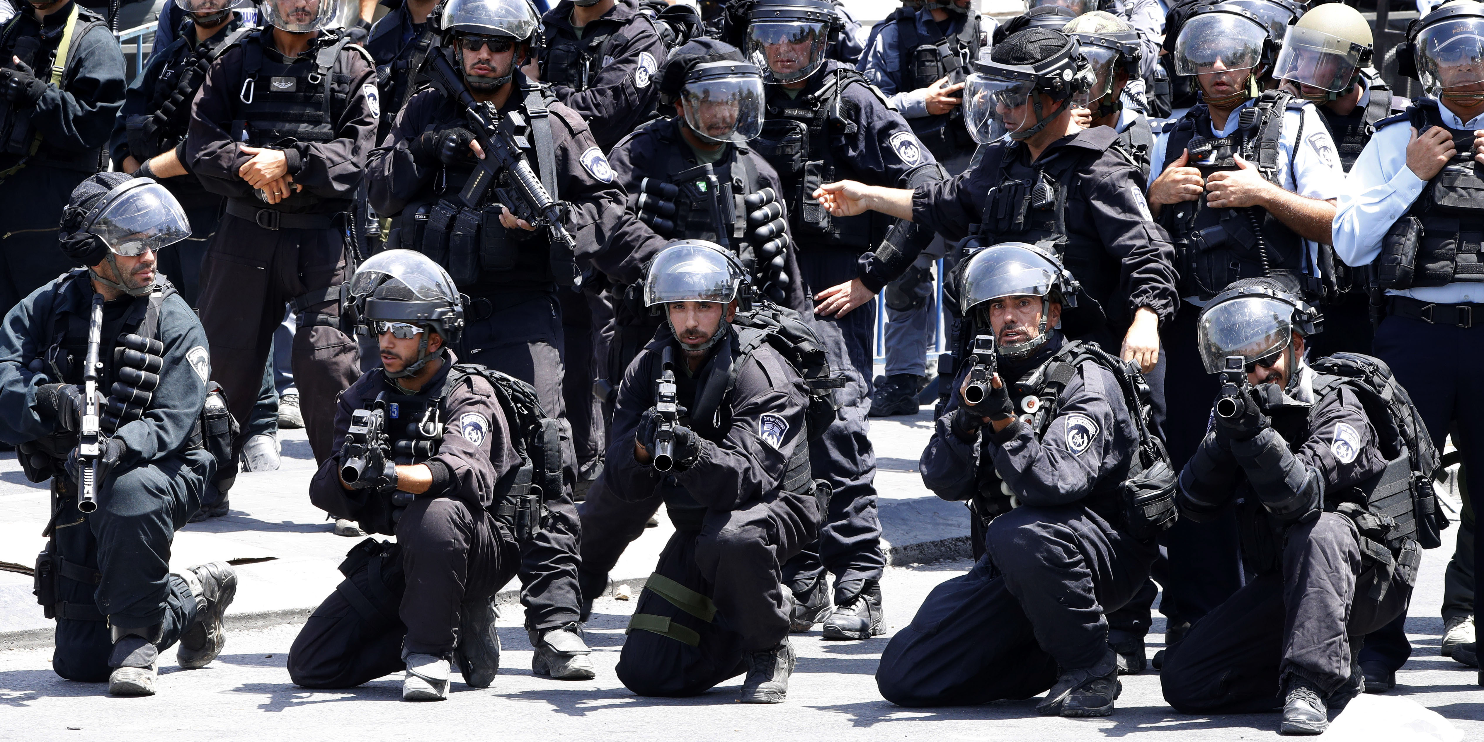 Israeli police forces hold stun grenades launchers following Friday noon prayer outside Jerusalem's old city on July 28, 2017.Israel barred men under 50 from prayers at a sensitive Jerusalem holy site, with more clashes feared after Palestinians ended a boycott of the compound and entered for the first time in two weeks. / AFP PHOTO / Jack GUEZ (Photo credit should read JACK GUEZ/AFP/Getty Images)