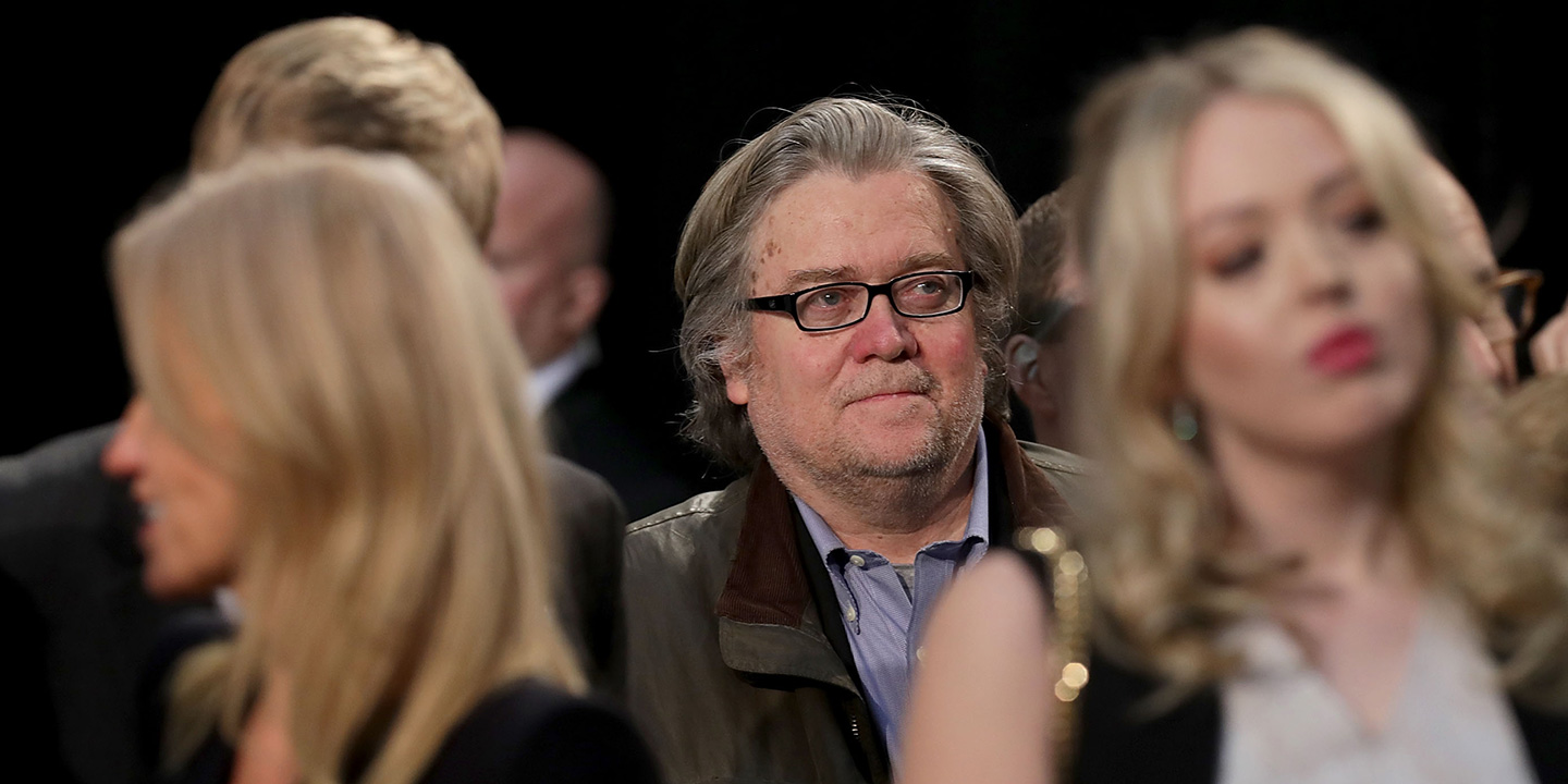 GRAND RAPIDS, MI - NOVEMBER 08:  Republican presidential nominee Donald Trump's campaign CEO Steve Bannon (C) listens to Trump speak during his final campaign rally on Election Day in the Devos Place November 8, 2016 in Grand Rapids, Michigan. Trump's marathon last day of campaigning stretched past midnight and into Election Day.    (Photo by Chip Somodevilla/Getty Images)